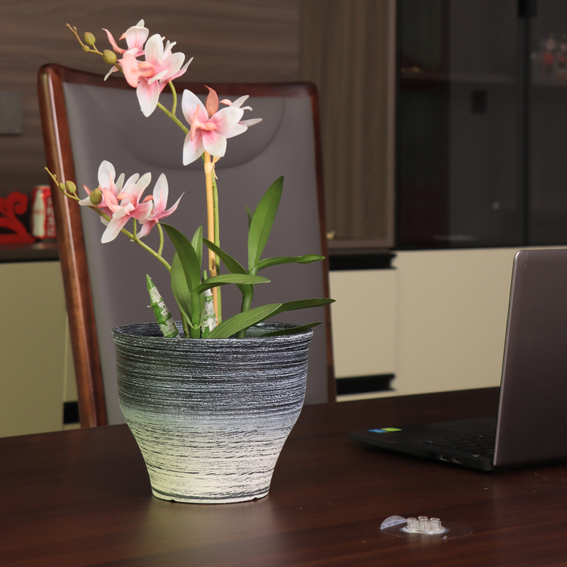 Maceta con chorro de arena de dos tonos de barril redondeado