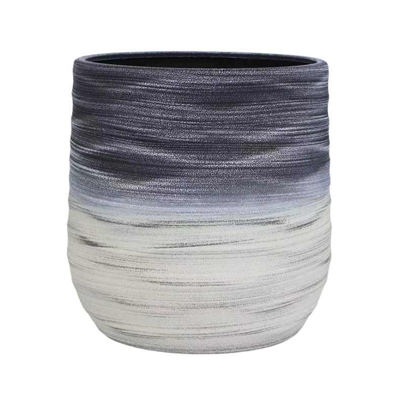 Maceta decorativa de pie en forma de onda